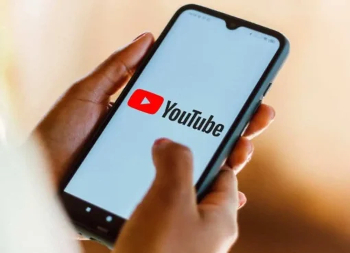 YouTube interface with firearm content warning message