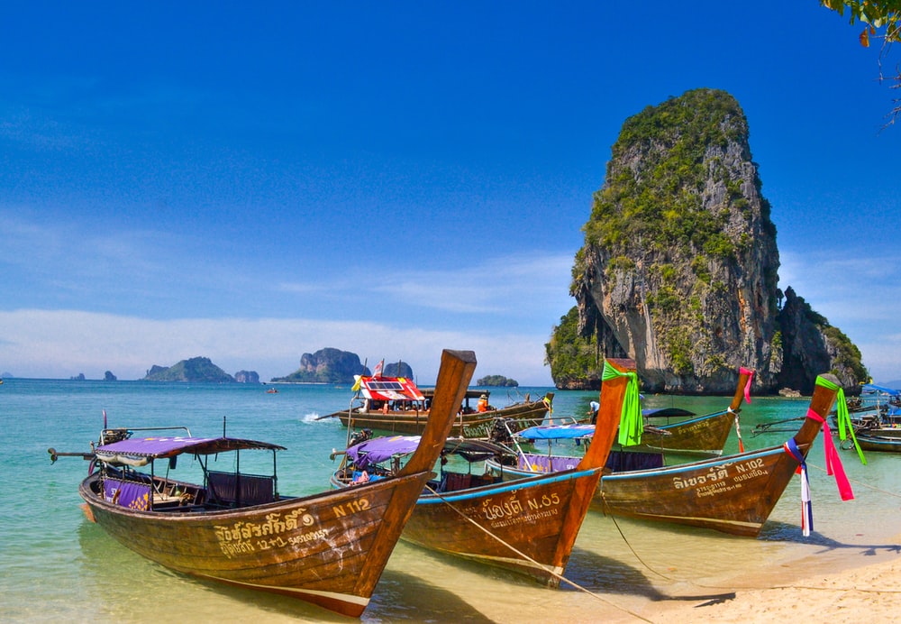 Long-tail boats on the beach in Krabi, Thailand 