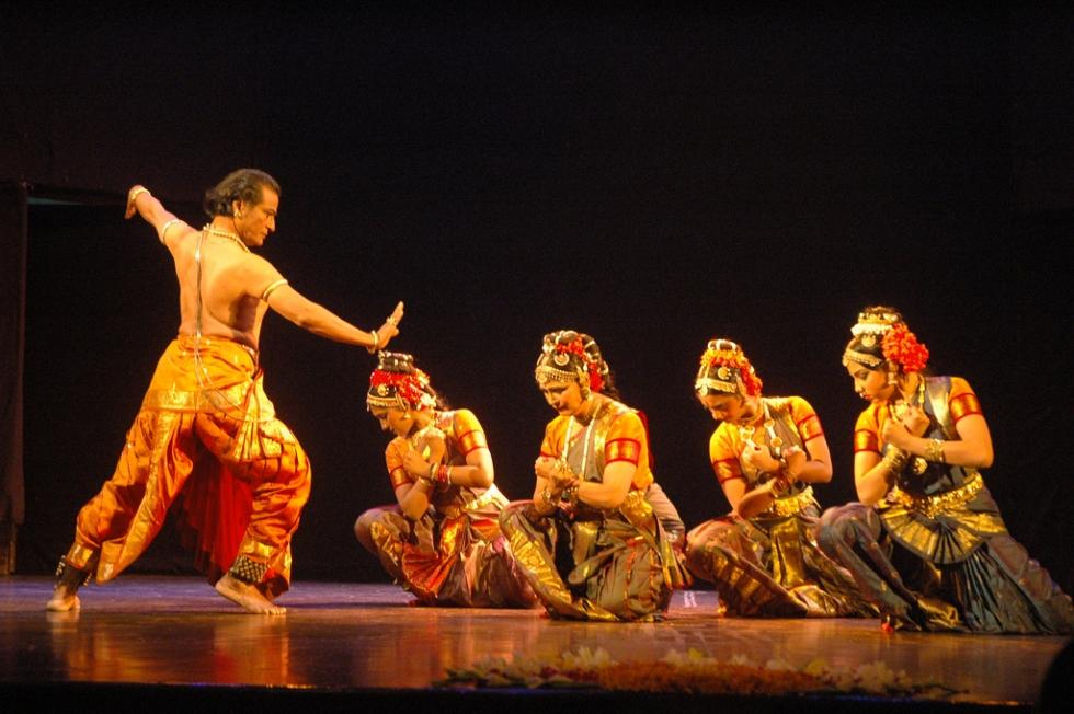 Kuchipudi dancer showcasing expressive mudras and gestures 
